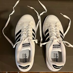 Adidas white leather shoes with black stripes, size men’s 7 1/2.